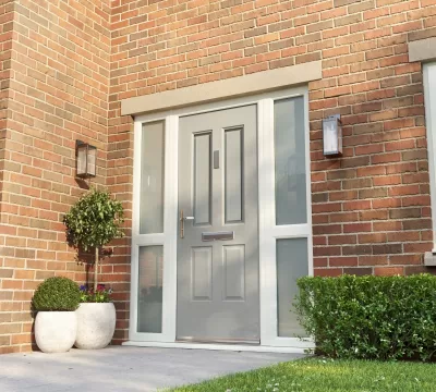 Grey composite Rockdoor with double glass panels.