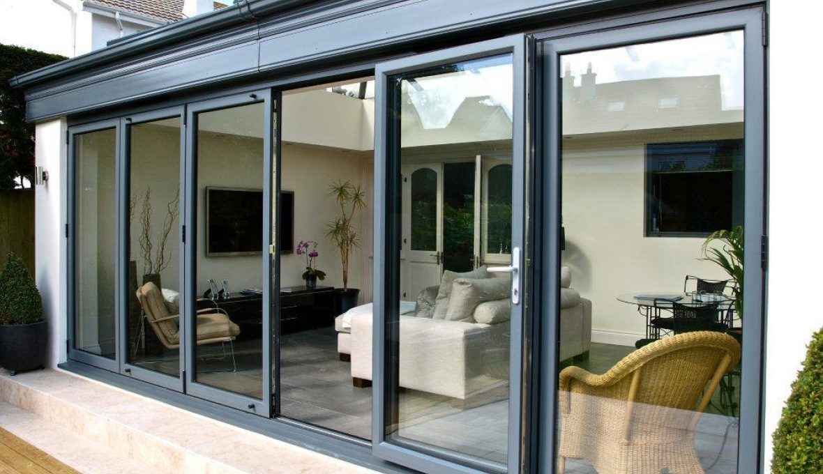 Bifold aluminium doors with modern, stylish black frames.