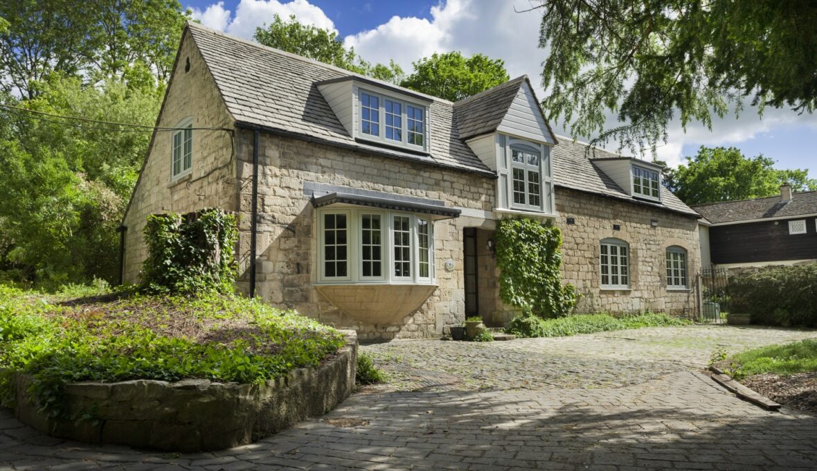 Stunning home with bay windows by Keswick Superglaze