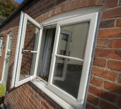 White uPVC casement window with two panels, one open.