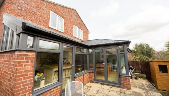 Ultraframe hup solid roof extension with modern, black frames.