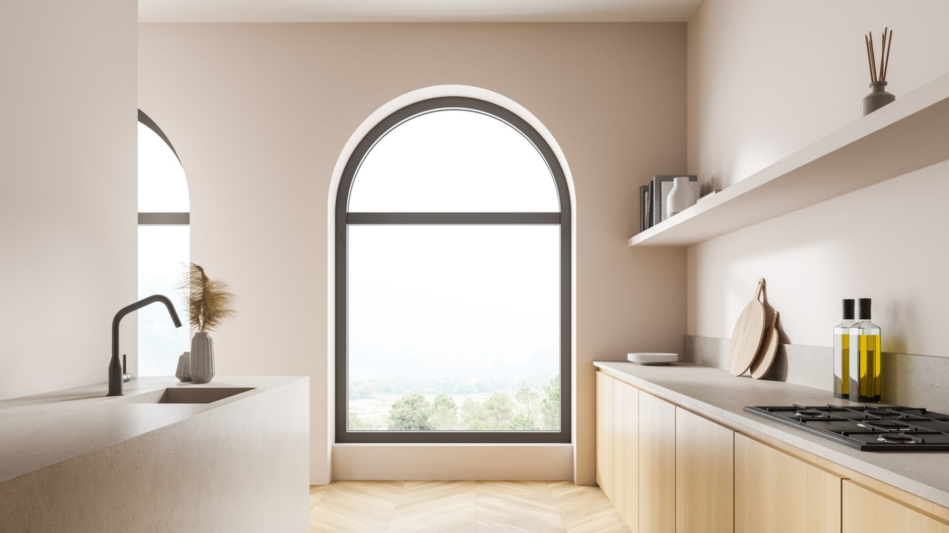 Large arched window with dark grey frames, in a modern and minimalist kitchen
